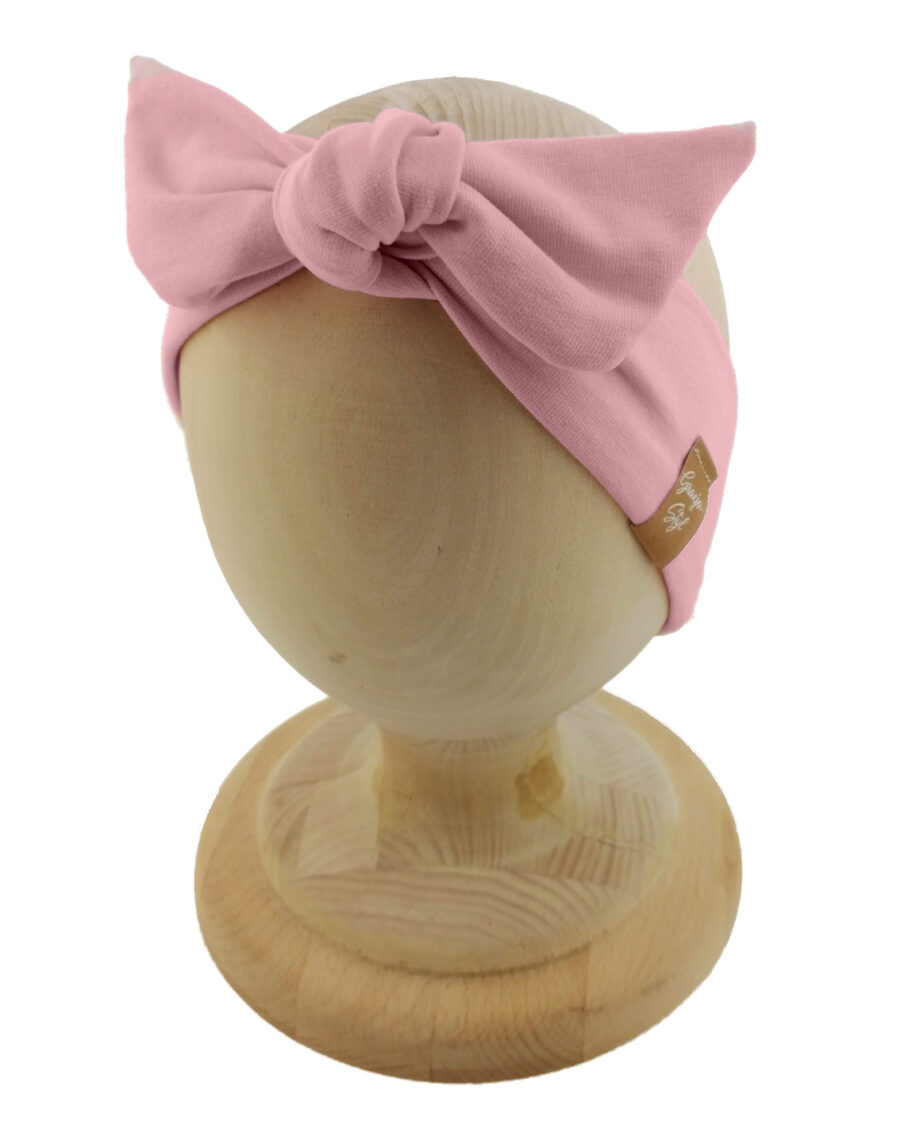 Opaska kobieca typu Pin-up marki Gracja Styl. Uszyta z bawełny petelkowej typu dresówka. Kolor pudrowy-róż.
